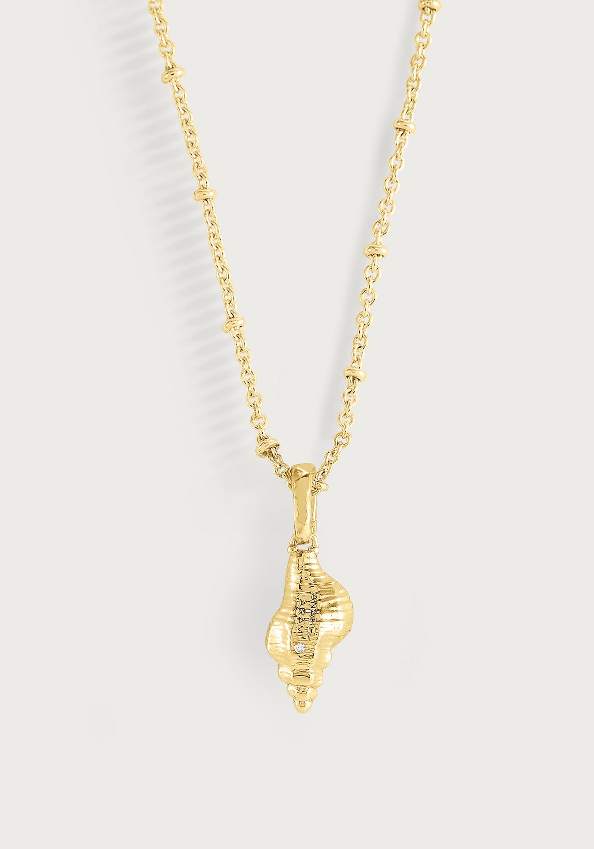 Milos Shell With Pearl Charm